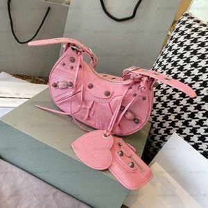 Balenciaga style pink motorcycle bag